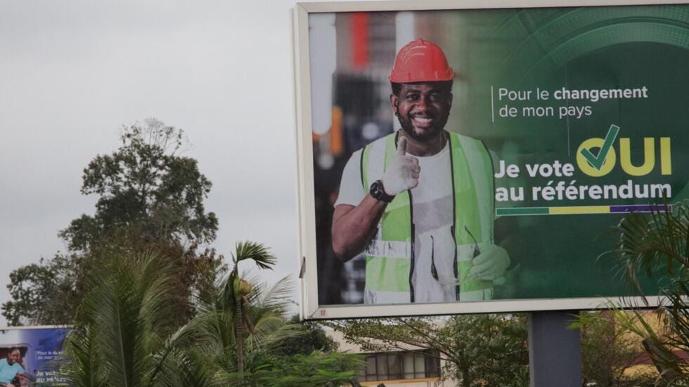 An electon poster for Gabon's constitutional referendum in Libreville on 29 August, 2024.