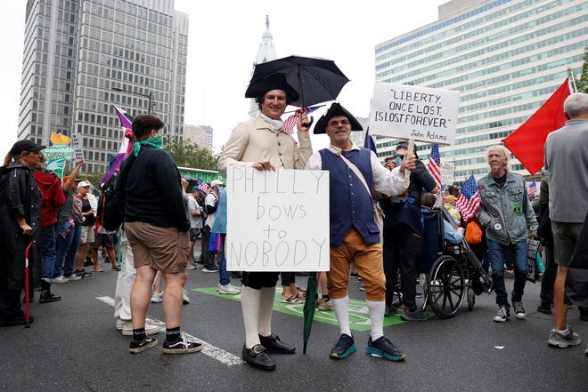 People participate in the "No Kings" protest in Philadelphia, Pennsylvania, June 14, 2025.