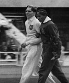 Carl (Luz) Long and Jesse Owens, arm in arm at the Olympic Stadium in Berlin, 1936