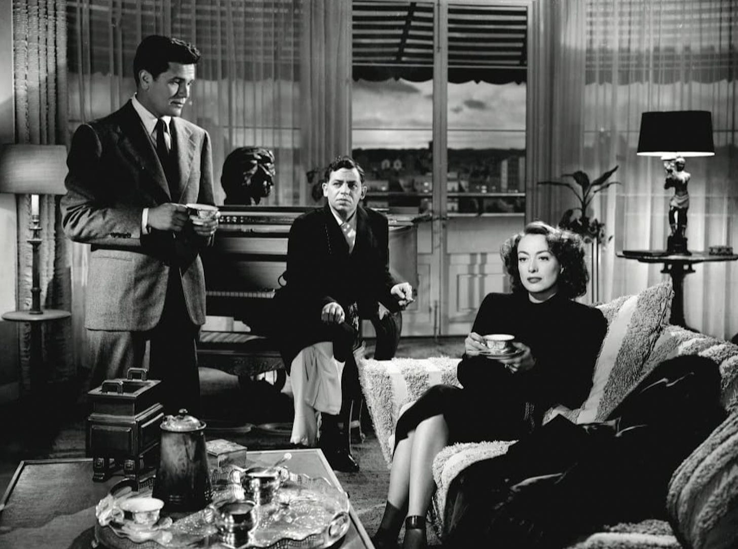 John Garfield, Oscar Levant, and Joan Crawford in “Humoresque” (1946)