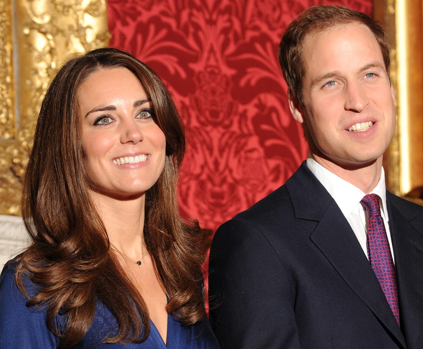 Smiling William and Kate at their engagement announcement
