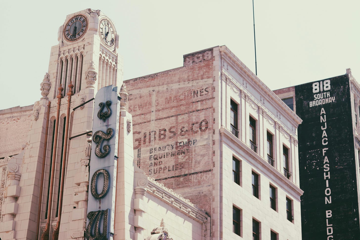 Rooftops of buildings in downtown Los Angeles including the Apple Tower Theater