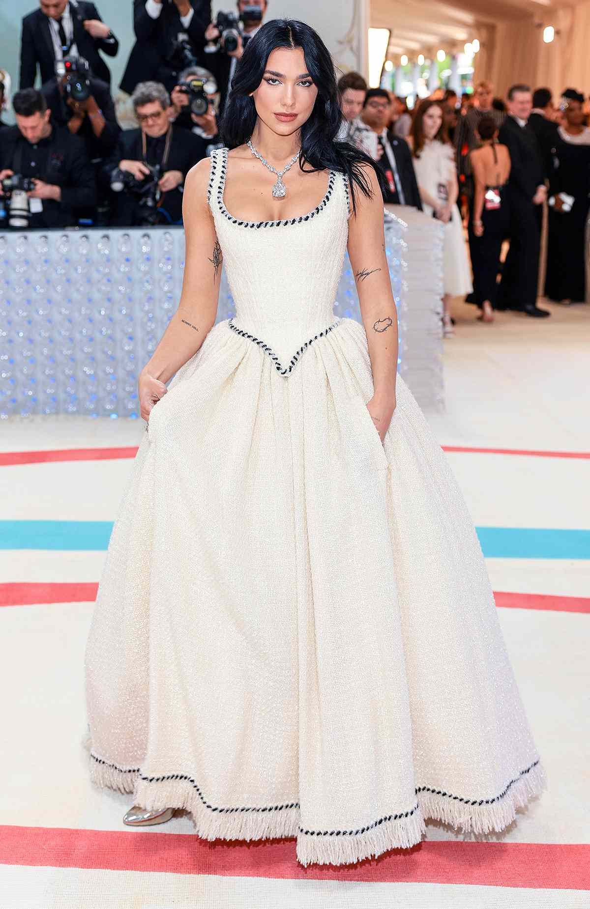 2023 Met Gala Co-Chair Dua Lipa Hits the Red Carpet in classic Chanel gown