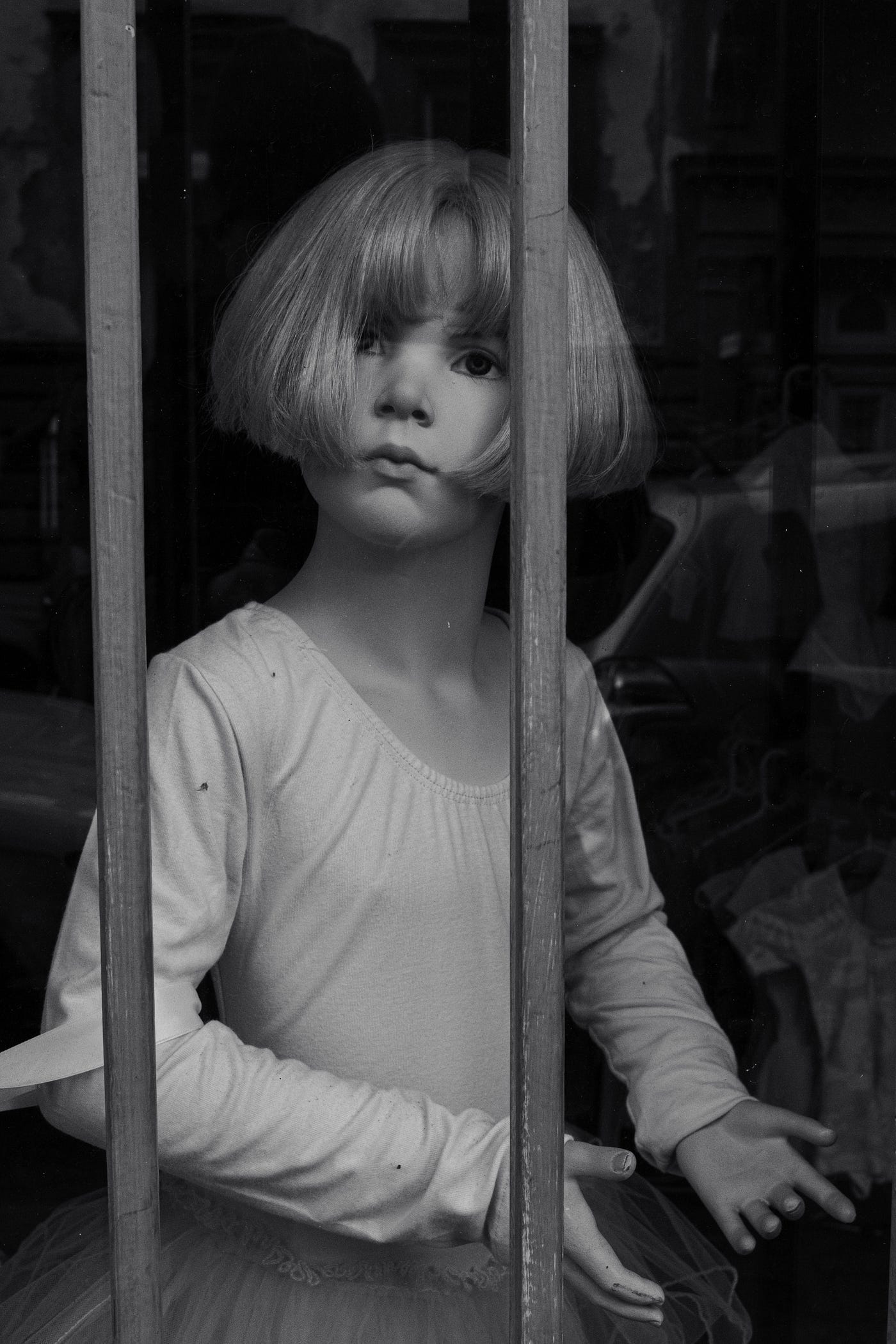 An imprisoned doll.