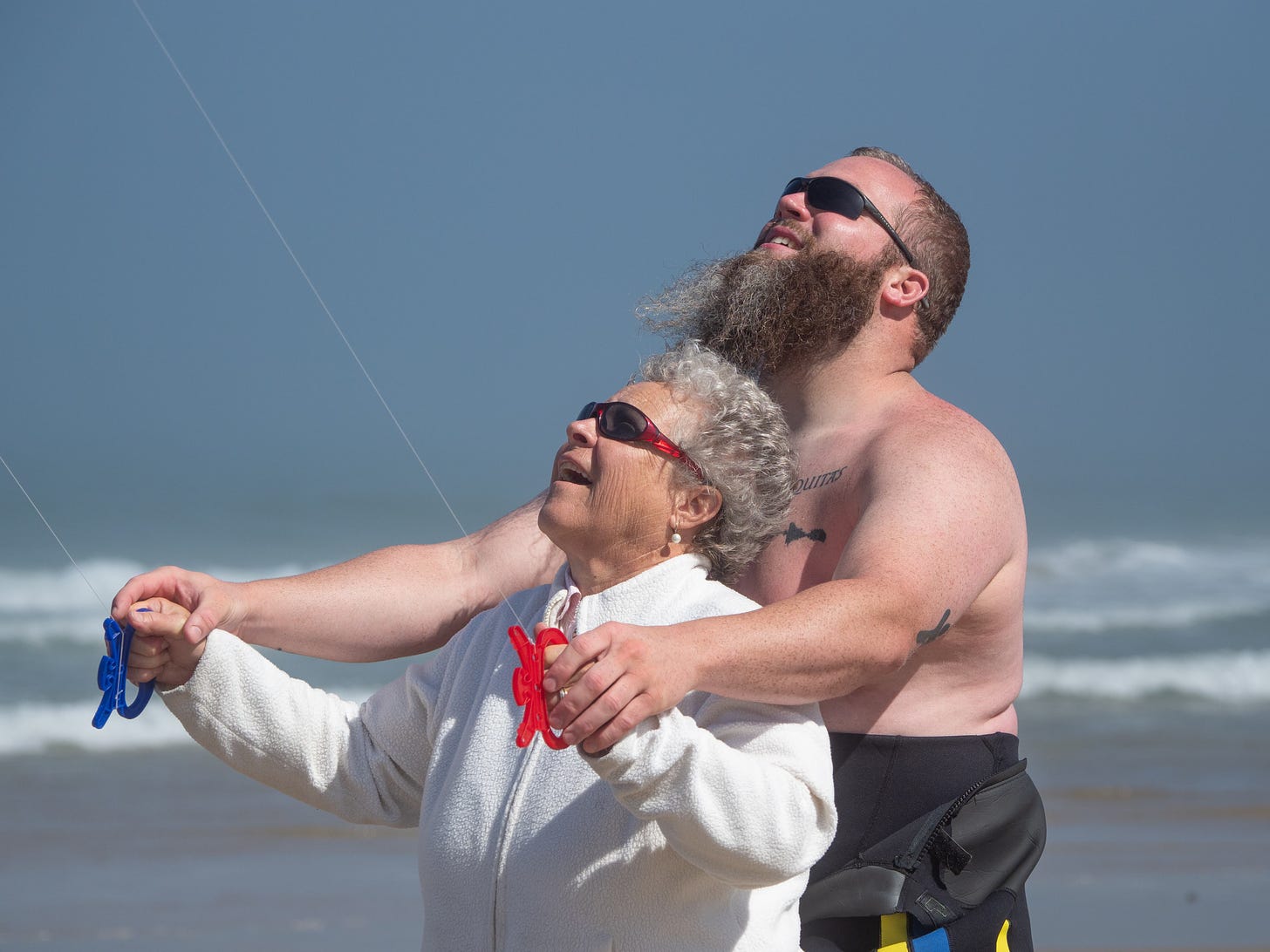 Flying a kite at the beach