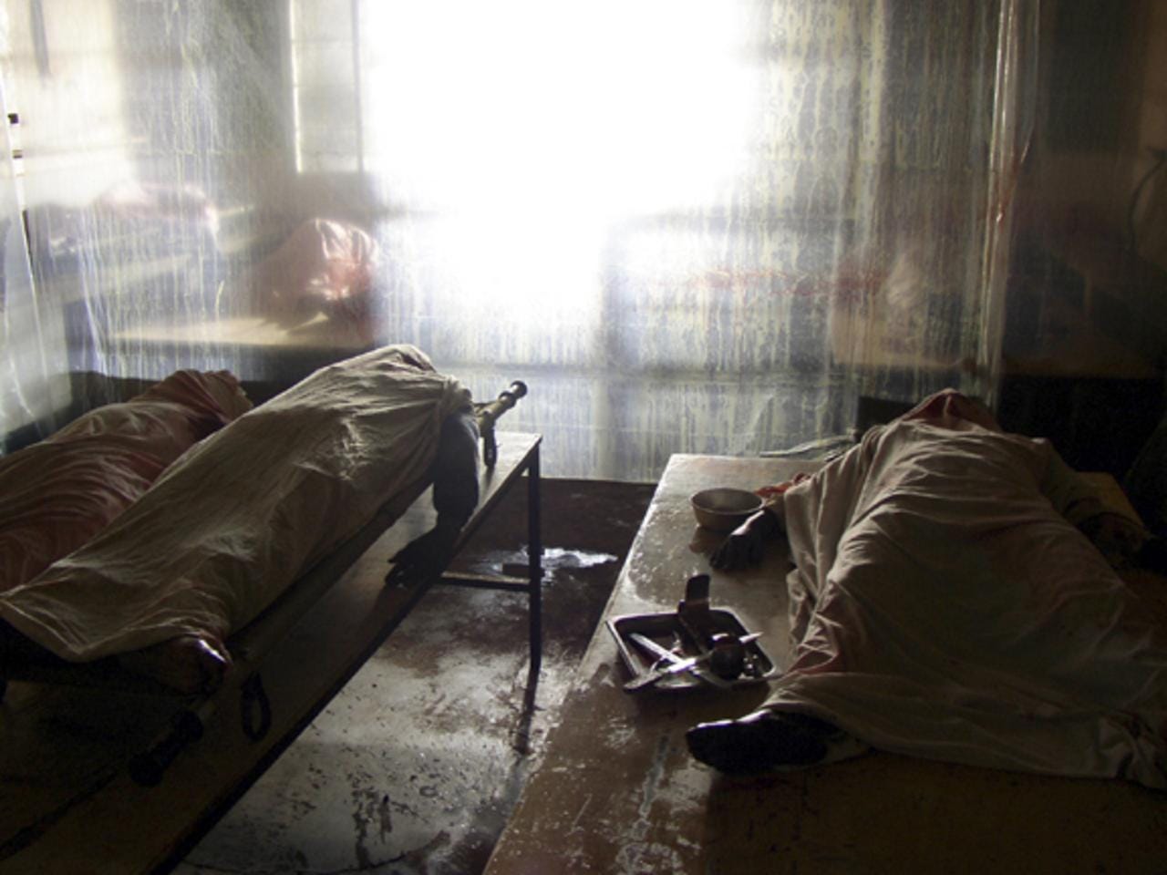 A scene from a Kigali morgue in Roger Spottiswoode's film &quot;Shake Hands with the Devil.&quot;
