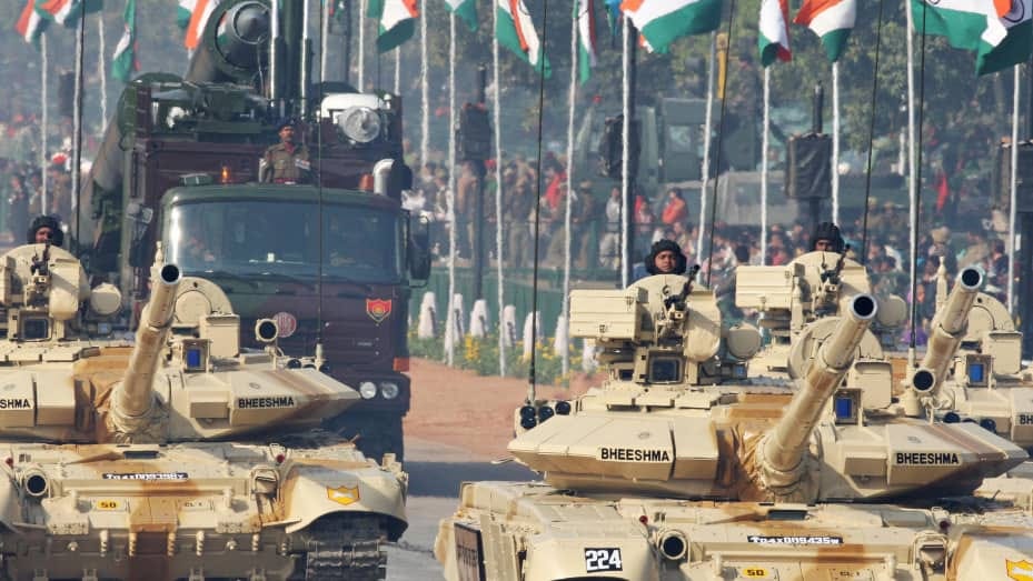 Indian Army T-90 Bheeshma tanks roll past during the full dress final rehearsal for the Indian Republic Day parade in New Delhi on January 23, 2009. (Photo credit RAVEENDRAN/AFP via Getty Images)