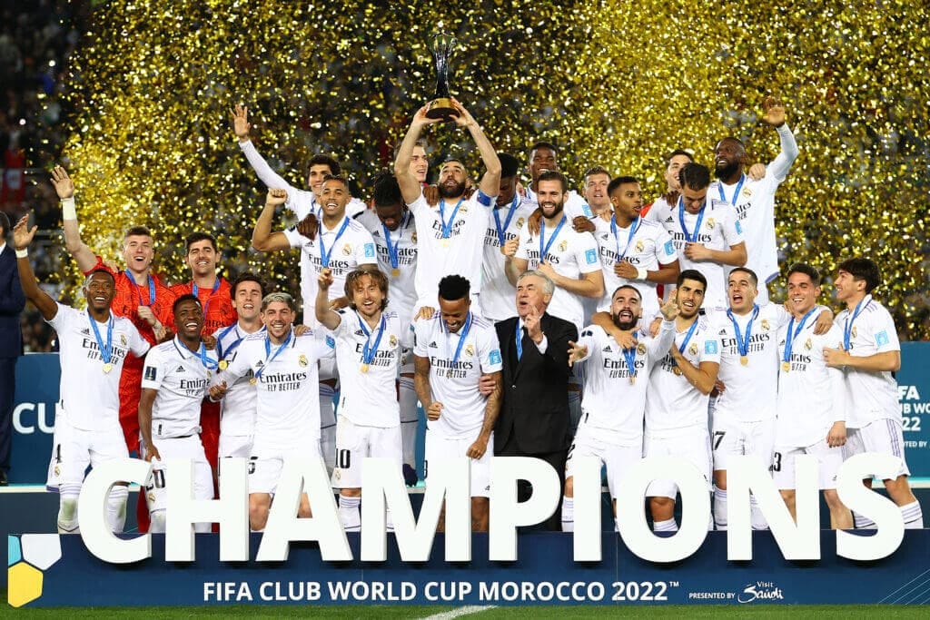 RABAT, MOROCCO - FEBRUARY 11: Karim Benzema of Real Madrid lifts the FIFA Club World Cup Morocco 2022 Trophy following their sides victory in the FIFA Club World Cup Morocco 2022 Final match between Real Madrid and Al Hilal at Prince Moulay Abdellah on February 11, 2023 in Rabat, Morocco. (Photo by Michael Steele/Getty Images)