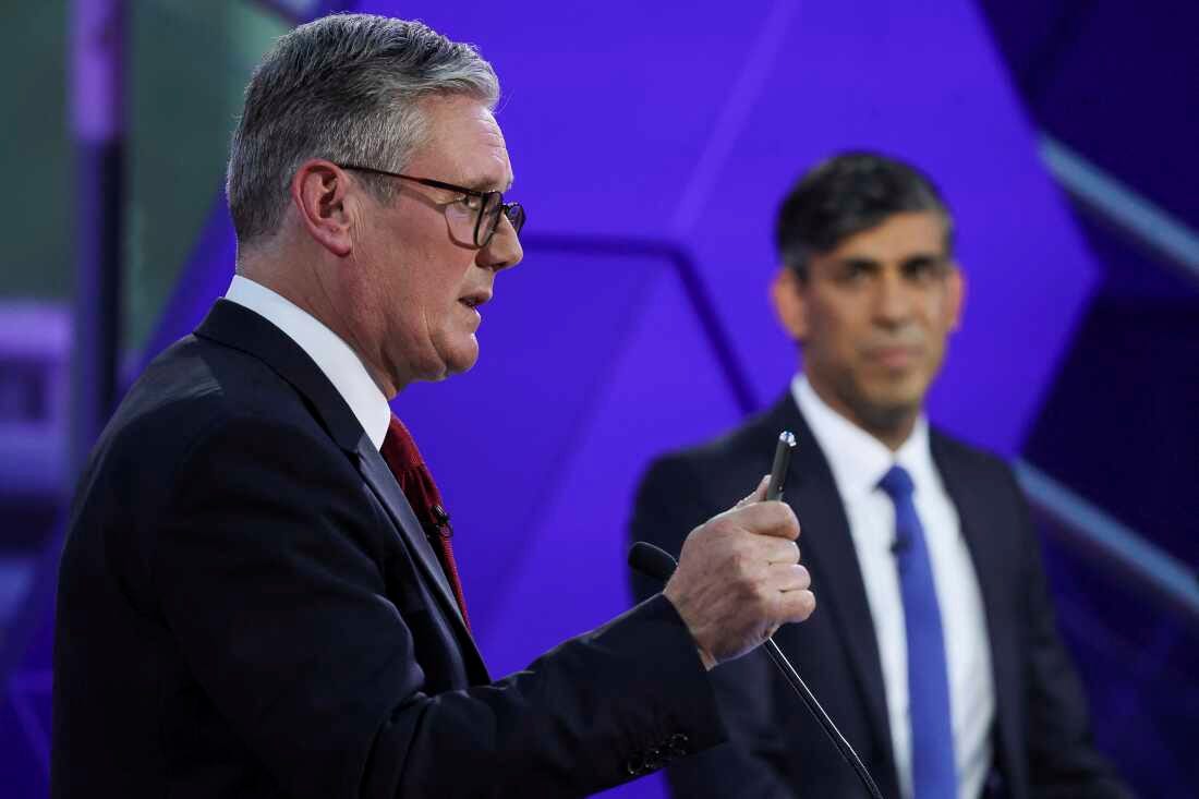 British Prime Minister Rishi Sunak (right) and opposition Labour Party leader Keir Starmer take part in a BBC debate, in Nottingham, England, on June 26.