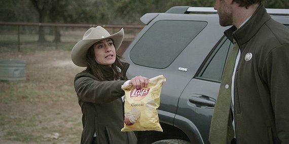 Walker Cassie handing Cordell a bag of potato chips to chill him out 2.13.