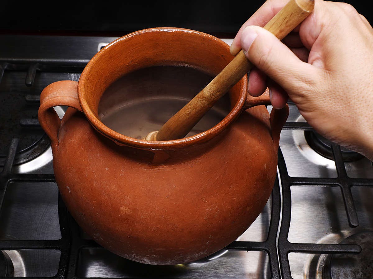 whisking chocolate in pot