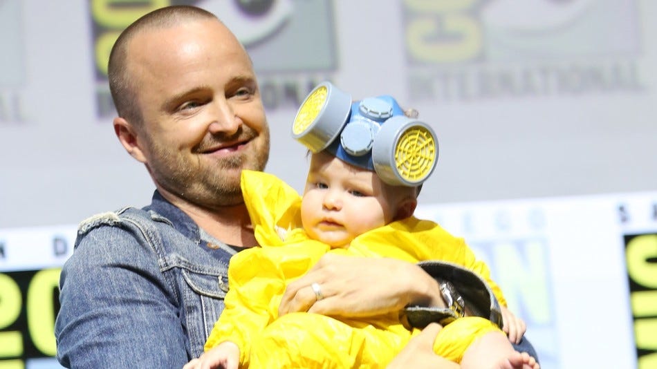 aaron paul with baby daughter in breaking bad hazmat