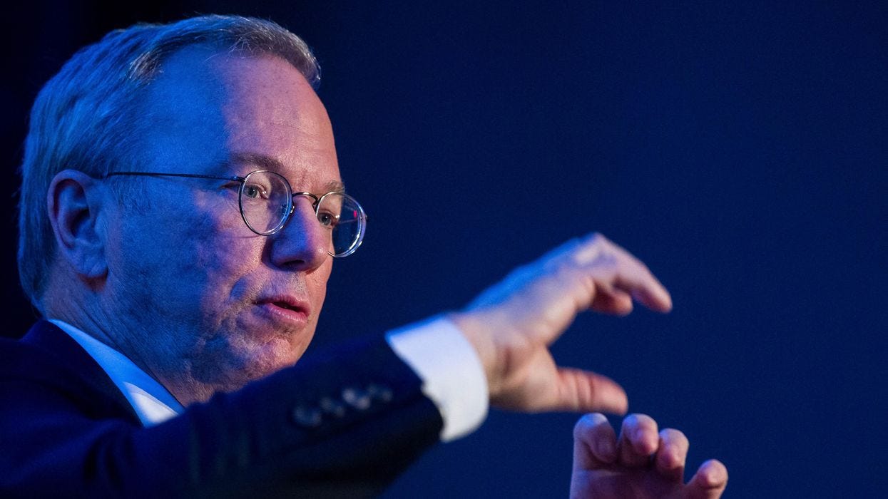 Alphabet executive chairman Eric Schmidt speaks to CEO and editor of the FP Group David Rothkopf after receiving the Diplomat of the Year Award in 2017.