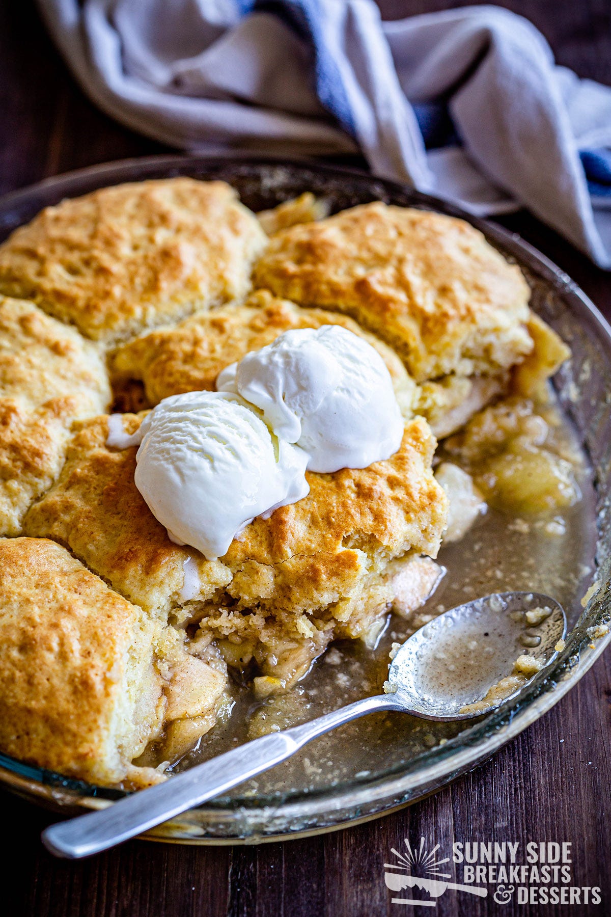 Apple cobbler with vanilla ice cream.