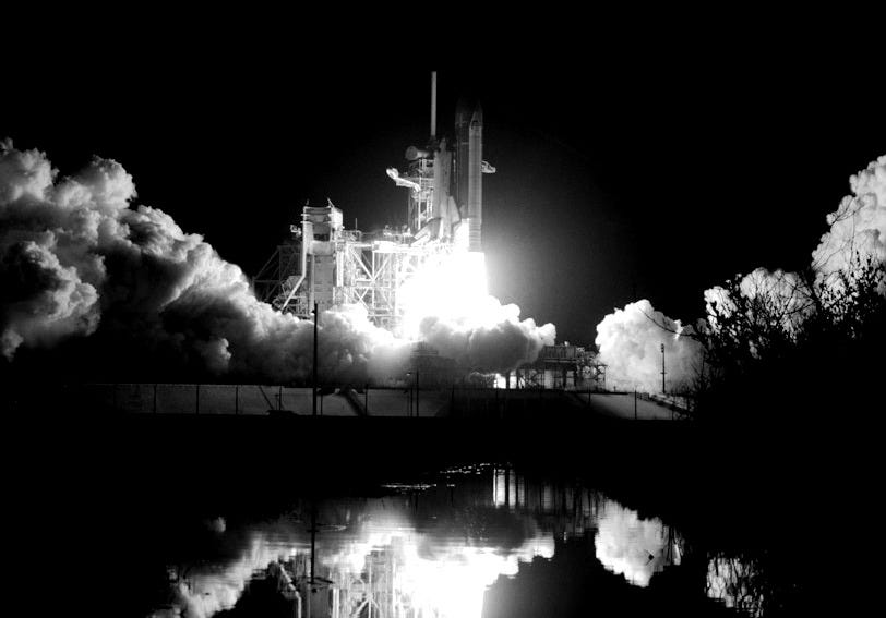 space shuttle taking off
