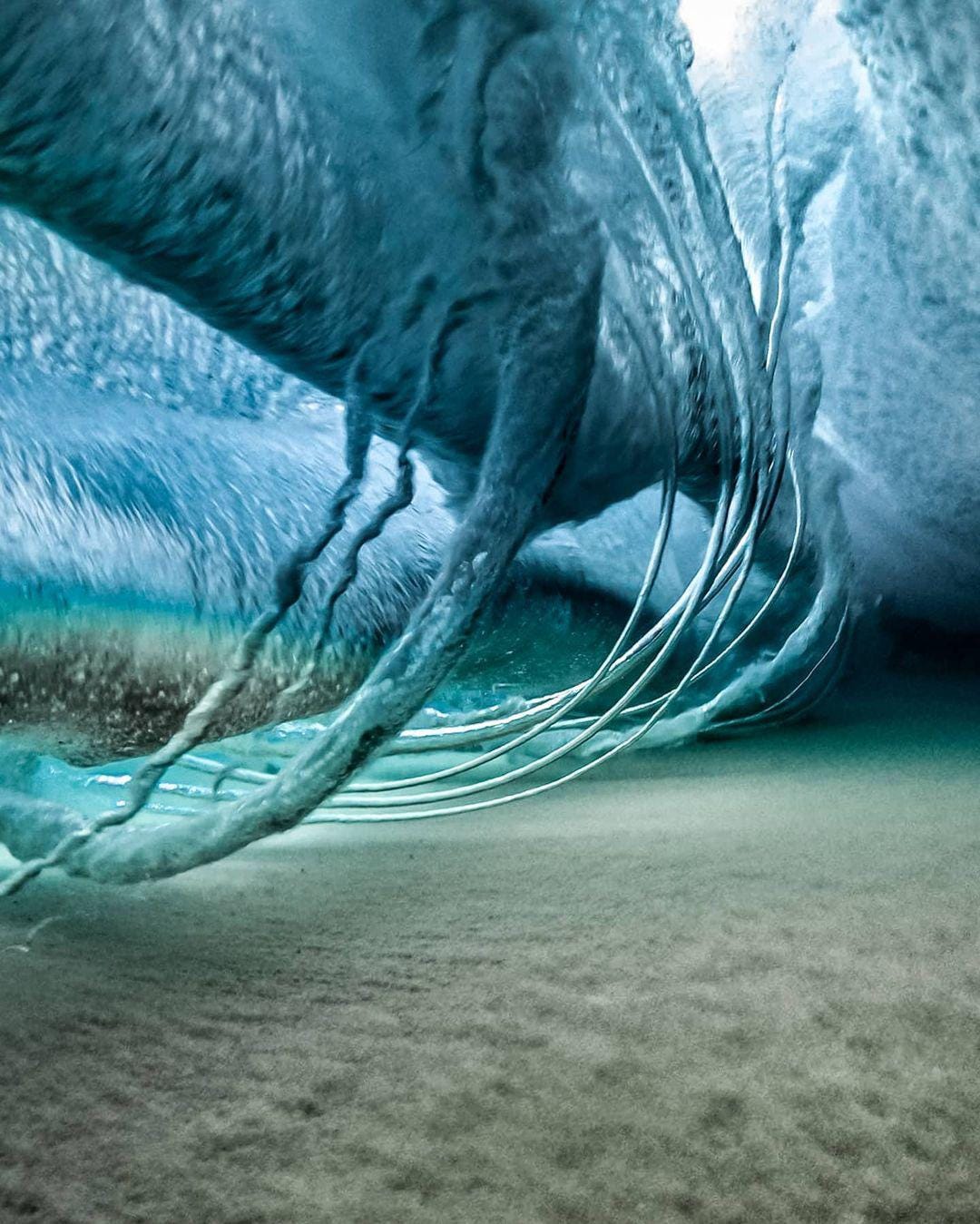 Rib vortices forming under a breaking wave : r/interestingasfuck