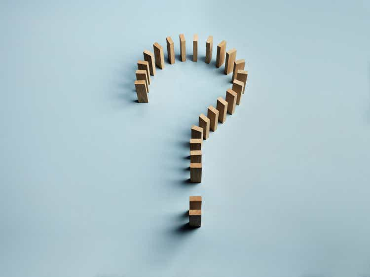 Question mark by wooden blocks