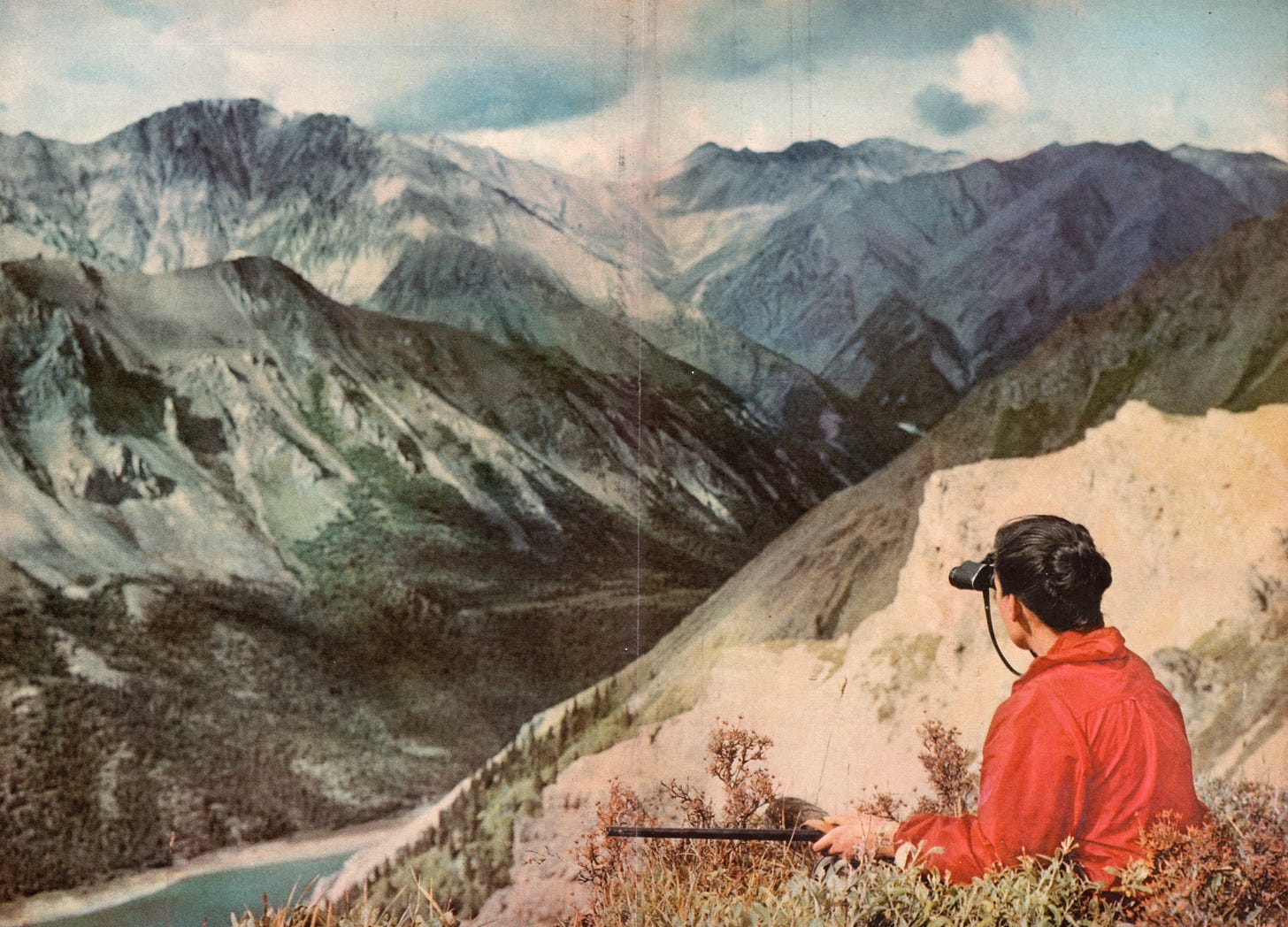 Virginia Kraft looks over the Alaskan wilderness on assignment for Sports Illustrated, 1959. Photo Courtesy Virginia Kraft Payson Estate