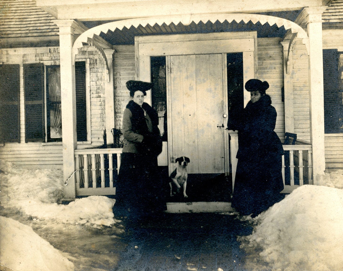 Two women and a dog