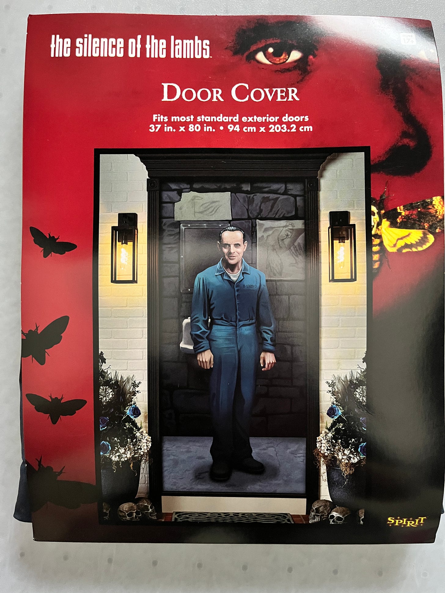 This Silence of the Lambs door cover features a picture of Hannibal Lecter standing at attention in his cell to greet you.