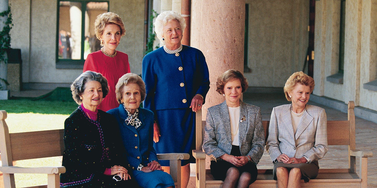 Portrait of former US First Ladies, seated from left, Lady Bird Johnson, Pat Nixon, Rosalynn Carter, and Betty Ford and, standing from left, Nancy Reagan and First Lady Barbara Bush, as they pose together at the opening of the Ronald Reagan Library, Simi Valley, California, November 4, 1991.