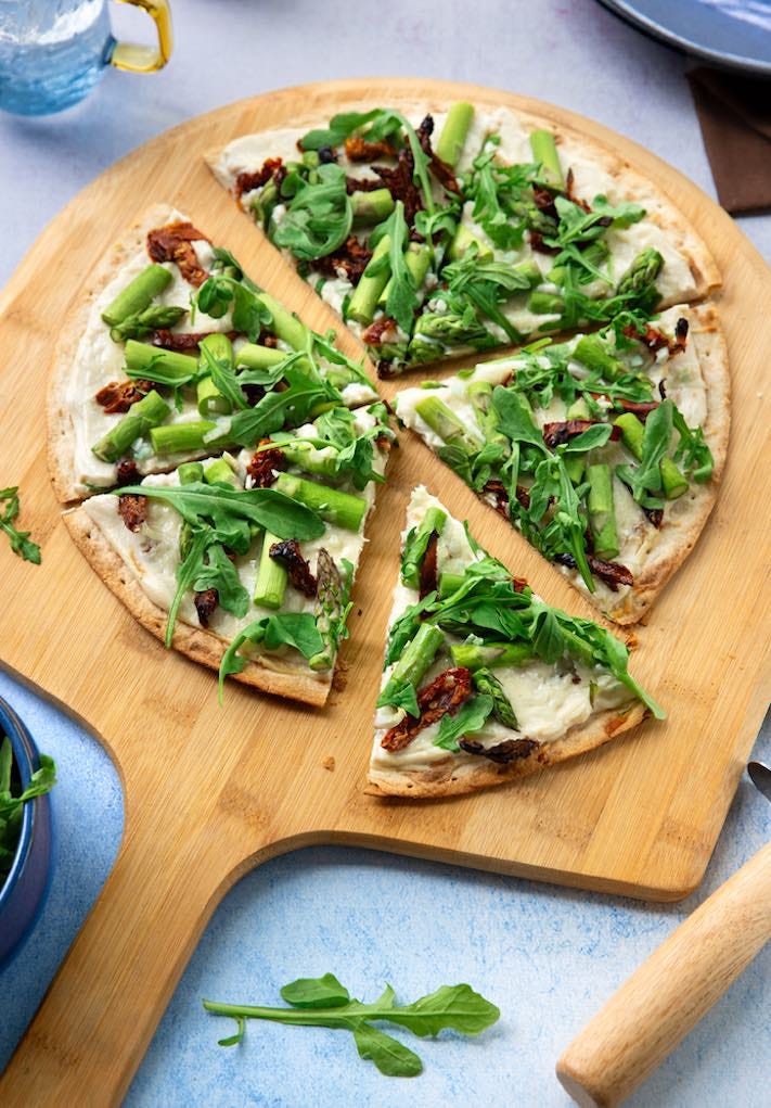 Vegan Asparagus and arugula white pizza