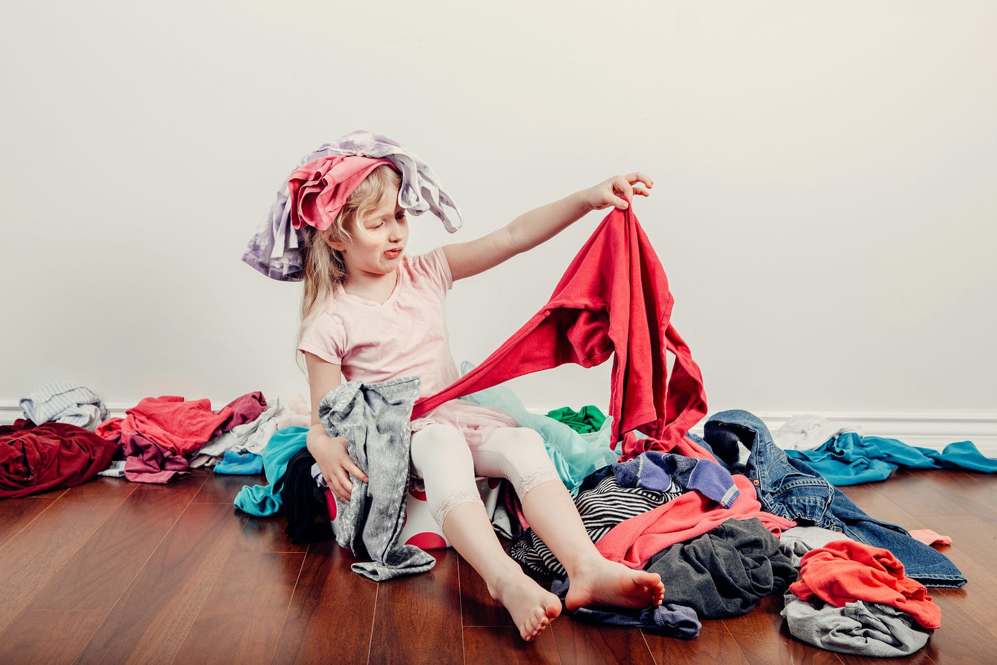 Kid playing with laundry