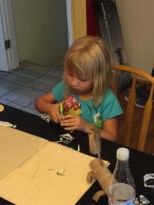 Trying to make her own animal.