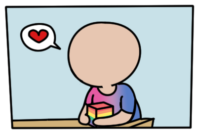 Person at table wearing a bi-flag T-shirt, holding a pride flag T-shirt and "saying" a heart.