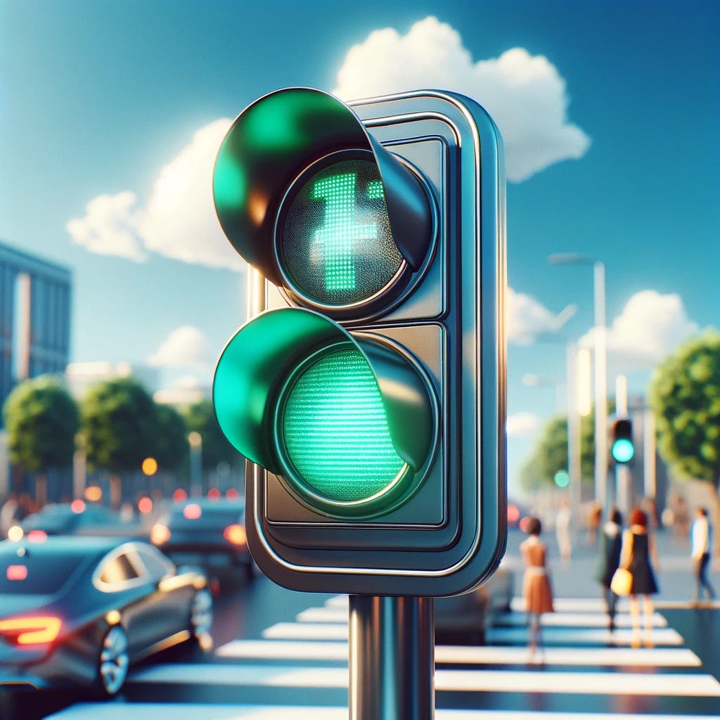 A vivid image of a traditional traffic signal, showing a green light illuminated against a clear blue sky. The traffic signal is mounted on a sleek, dark metal pole, and it is located at a busy city intersection. Several modern cars and pedestrians are visible in the background, waiting at the crosswalk. The focus of the image is on the bright green light, symbolizing 'go', with a few fluffy white clouds in the sky.