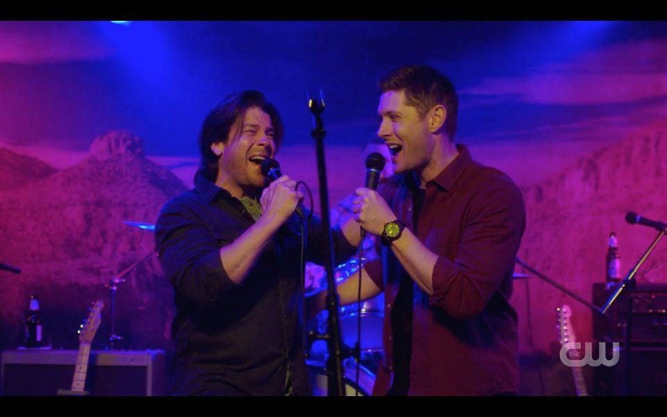 Christian Kane singing smiling with Jensen Ackles Dean Winchester SPN