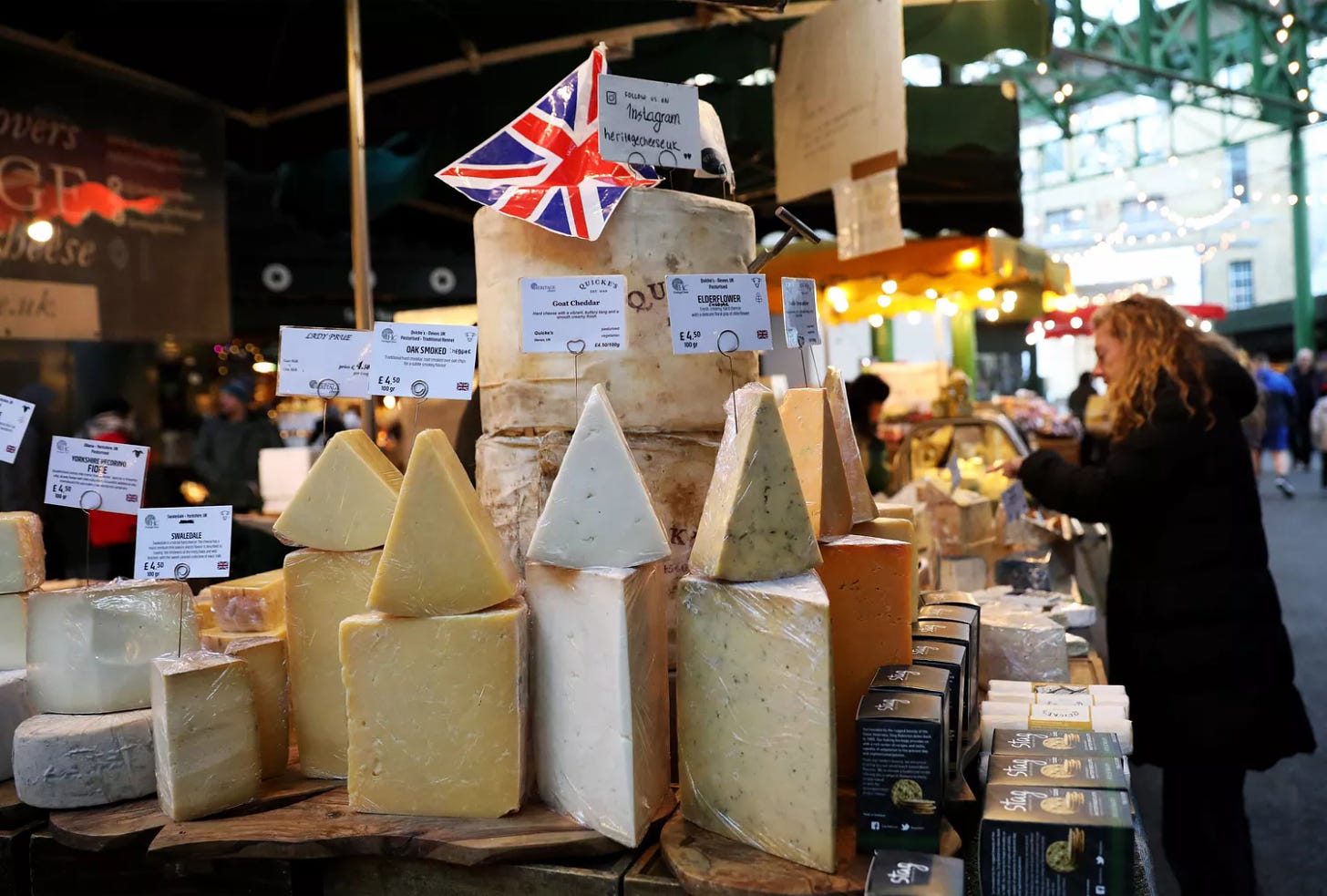 A view of cheeses for sale at Borough Market in London