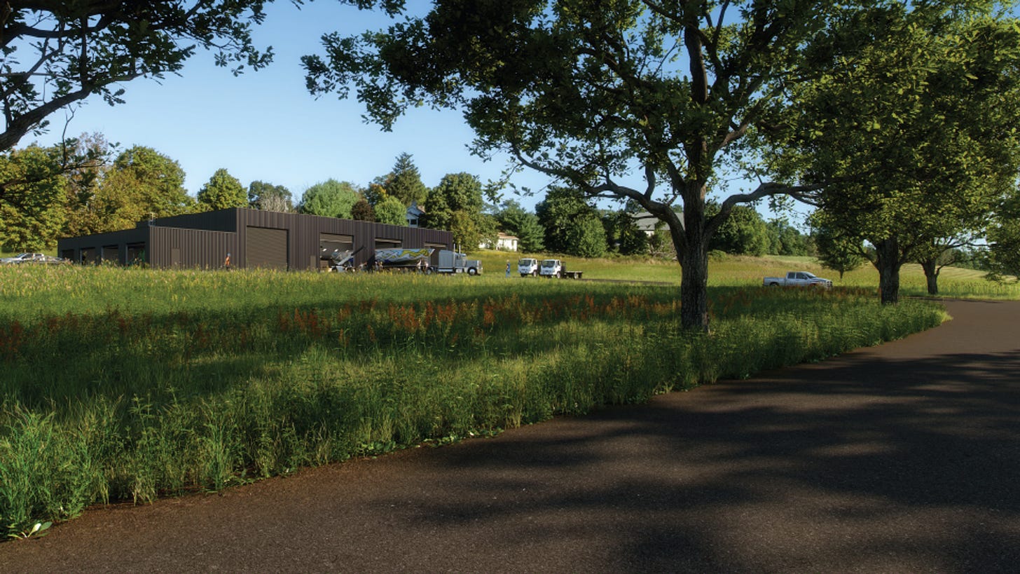Rendering of the new Conservation, Fabrication and Maintenance Building at Storm King Art Center. A paved path leads to a building past a field of grass and trees.