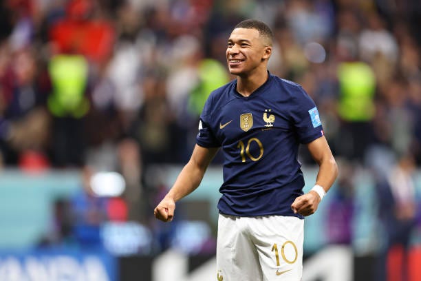 Kylian Mbappe of France celebrates during the FIFA World Cup Qatar 2022 quarter final match between England and France at Al Bayt Stadium on December...