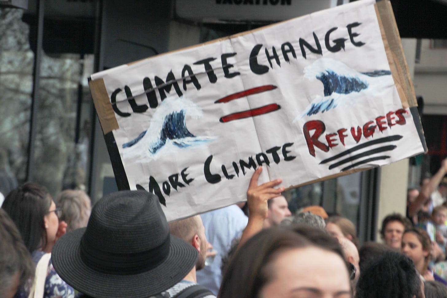 File:Climate change = more climate refugees. -Melbourneclimatestrike IMG  5187 (48765007057).jpg - Wikimedia Commons