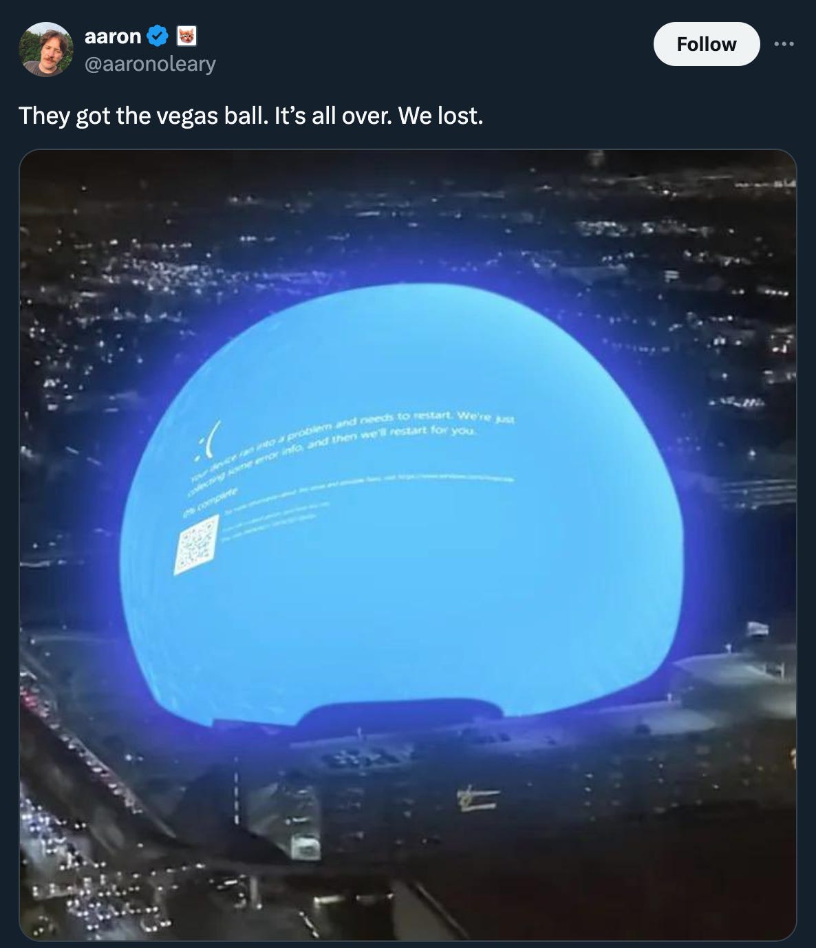 A tweet showing the Vegas Sphere with a blue screen of death. Caption: "They got the vegas ball. It’s all over. We lost."