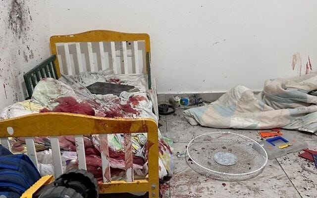 A blood-soaked child's bed in Kibbutz Kfar Aza seen in a photo shared by Prime Minister Benjamin Netanyahu on Oct. 11, 2023 in the aftermath of the Hamas assault on Israel on Oct. 7. (X/Netanyahu)