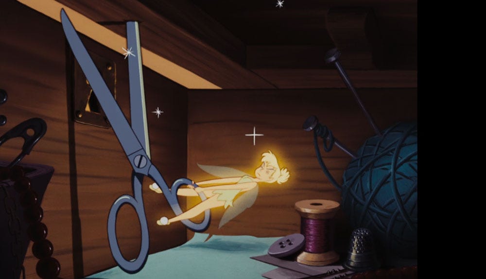 Tinker Bell the fairy pulls on the handle of a huge pair of scissors trying to escape from the sewing drawer she is trapped in - still from 1953 Disney animation Peter Pan