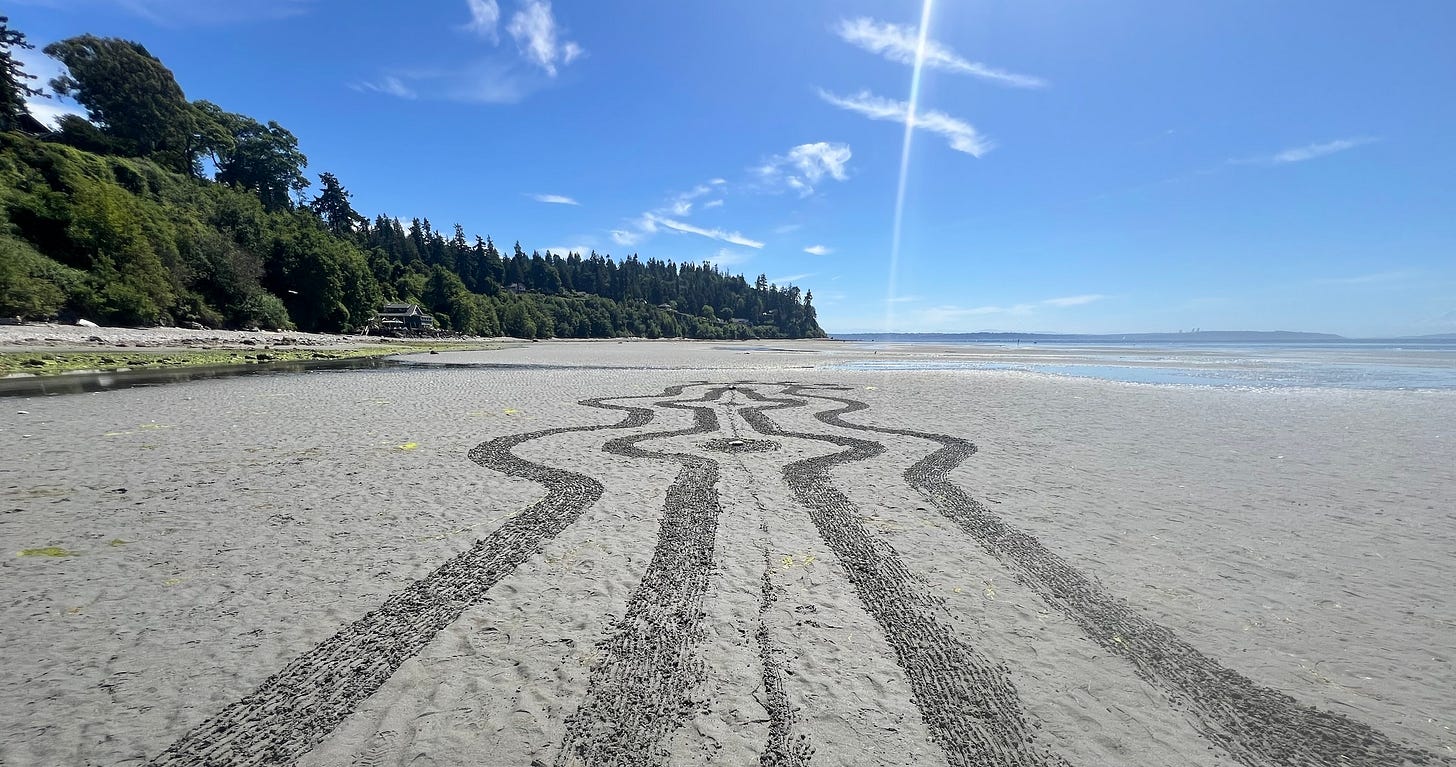 tower shape end of maze in sand on beach