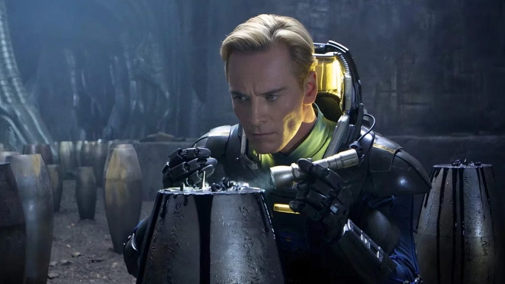David 8 android inspecting the oozing black goo from the mysterious canisters from Prometheus (2012) David 8 android inspecting the oozing black goo from the mysterious canisters from Prometheus (2012)