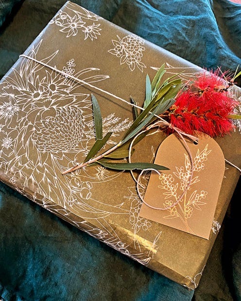 FREE Christmas Gift Wrapping - picture of Herbal Starter Kit in gorgeous wrapping paper with bottlebrush and gift tag. Learn herbal medicine easily with the Herbal Starter Kit | Everyday Empowered