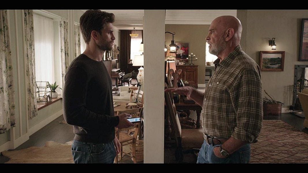 Gay Liam Keegan Allen in baggy jeans talking through a wall with big daddy Mitch Pileggi Bonham on Walker set.