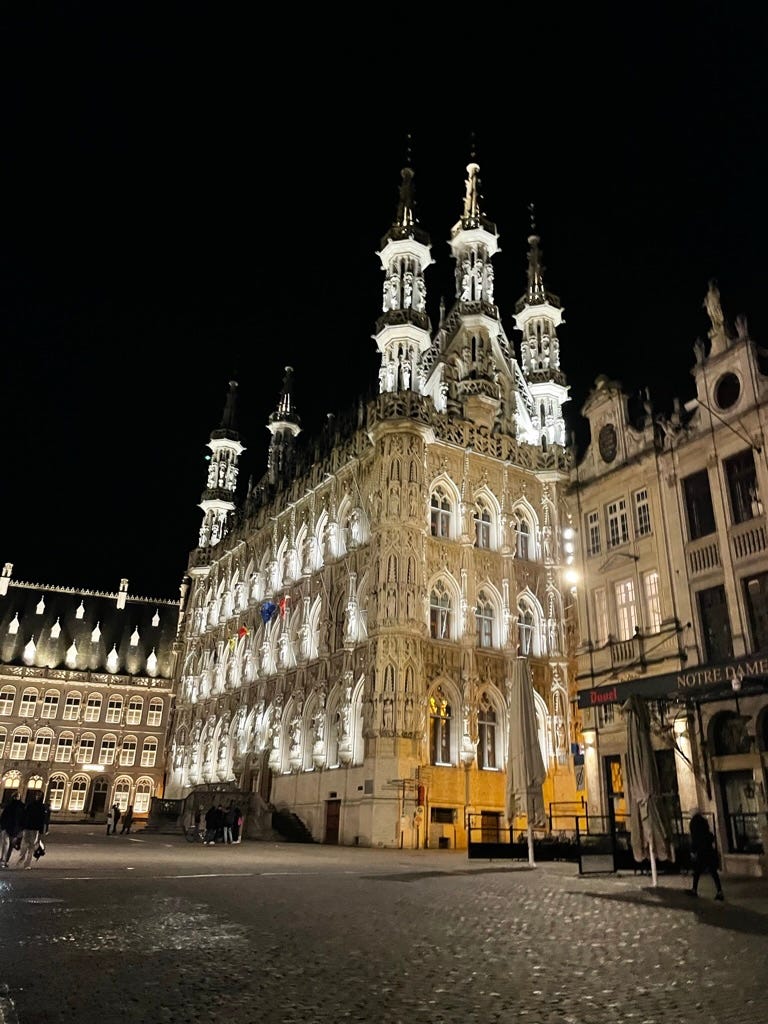 A white cathedral lit up in the dark