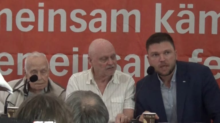 "Fighting together": Eremenko in August 2022 at a "NATO war against Russia" event organized by the "Society for Legal and Humanitarian Support" alongside Hans Bauer, the last Deputy Attorney General of the GDR.