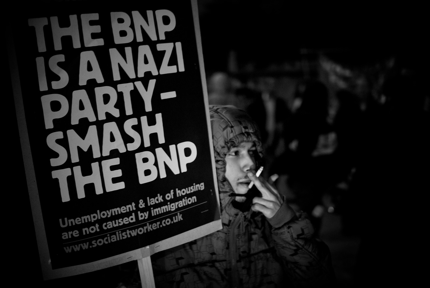 Man with anti-BNP sign. CC-BY-licensed photo by Andy Armstrong at https://www.flickr.com/photos/95236086@N00/4035014763