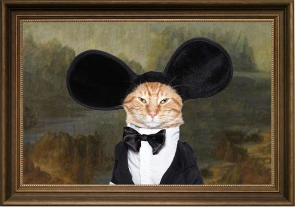 Indignant cat in mouse ears and tux in front of mono Lisa background framed in wood