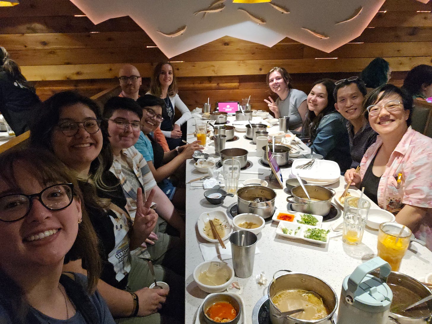 Group of graphic novel creators at hot pot.