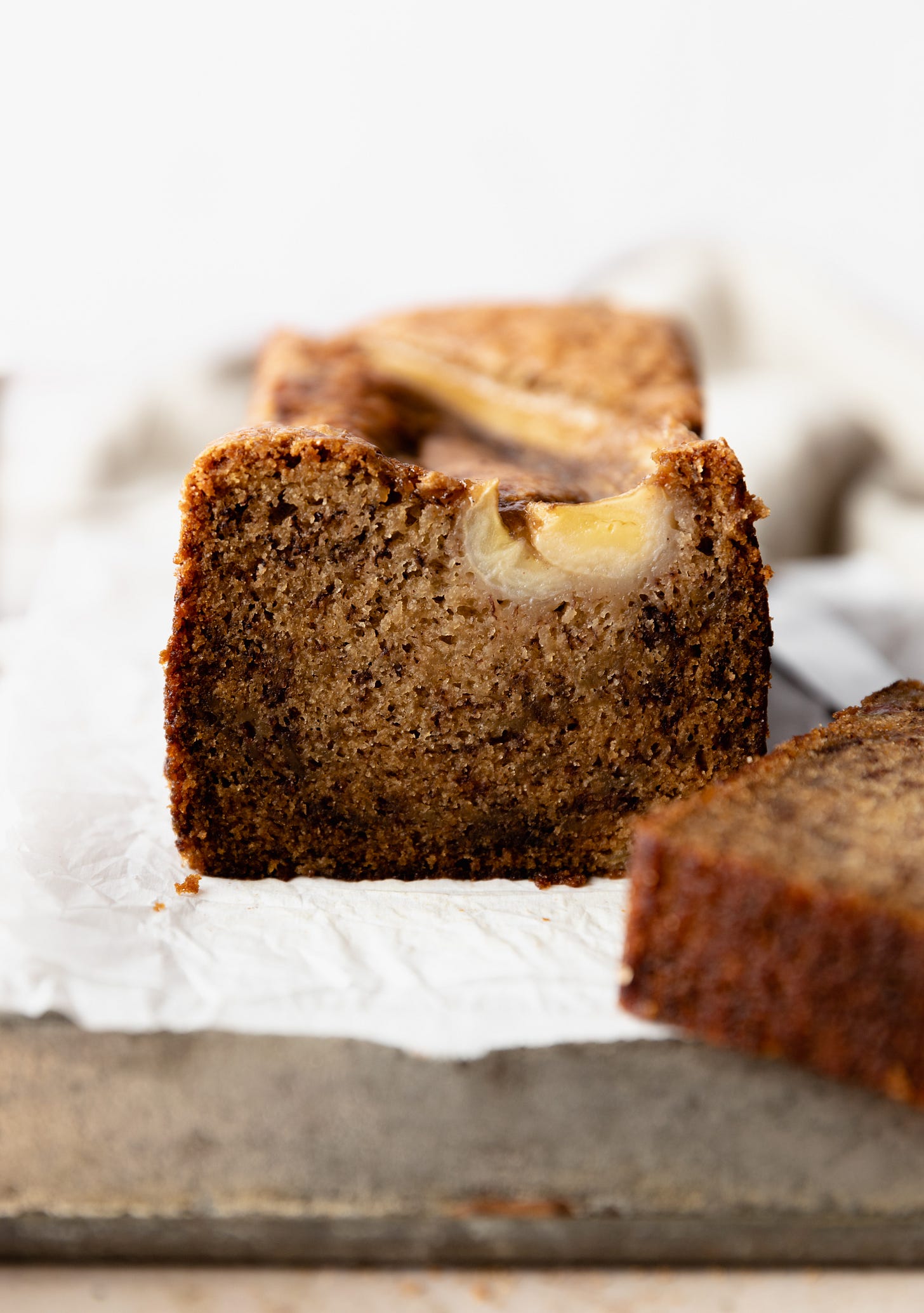 Vegan bananas foster bread frontal shot sliced open