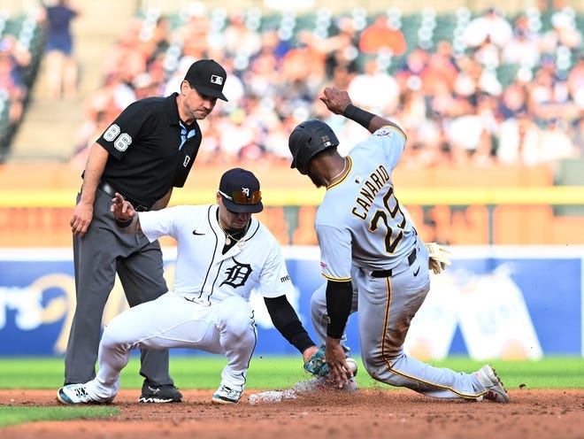 Tigers shortstop Javier Baez tags Pirates’ Alexander Canario (29) trying to steal second in the third inning. Detroit Tigers take on the Pittsburgh Pirates at Comerica Park in Detroit on Tuesday, June 17, 2025.