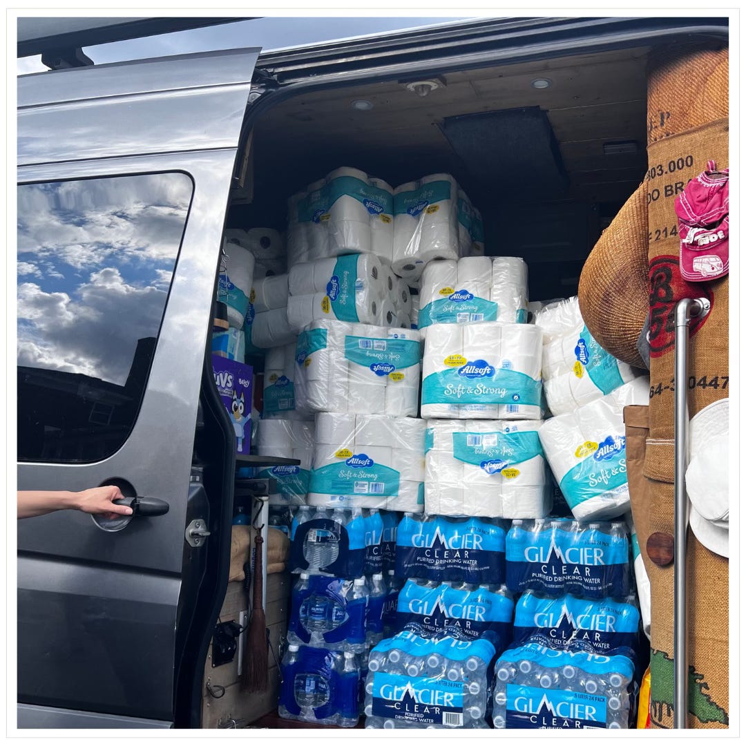 van loaded with water, paper products, wipes, etc. 